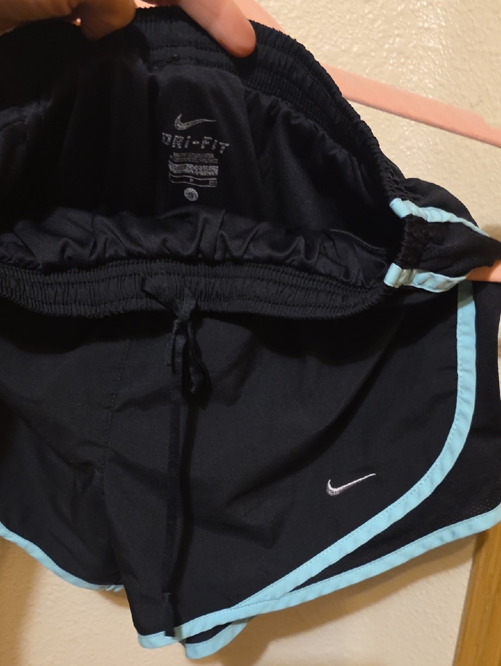 Nike Black Shorts with Light Blue Trim and White Swoosh